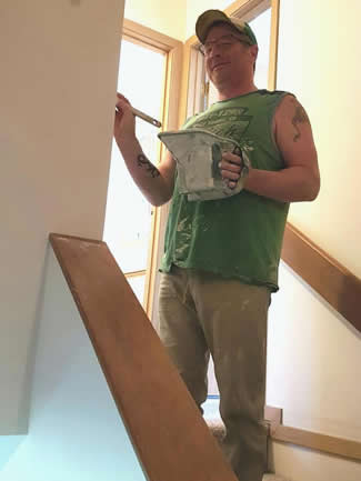 Gerry Painting On Stairway - SOSBIS Success Story